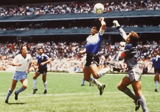 what is the hand of God in soccer - Maradona scoring a goal with his hand vs England