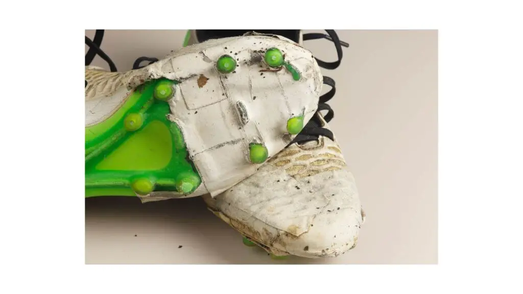 Baseball cleats vs Soccer cleats - a pair of soccer cleat