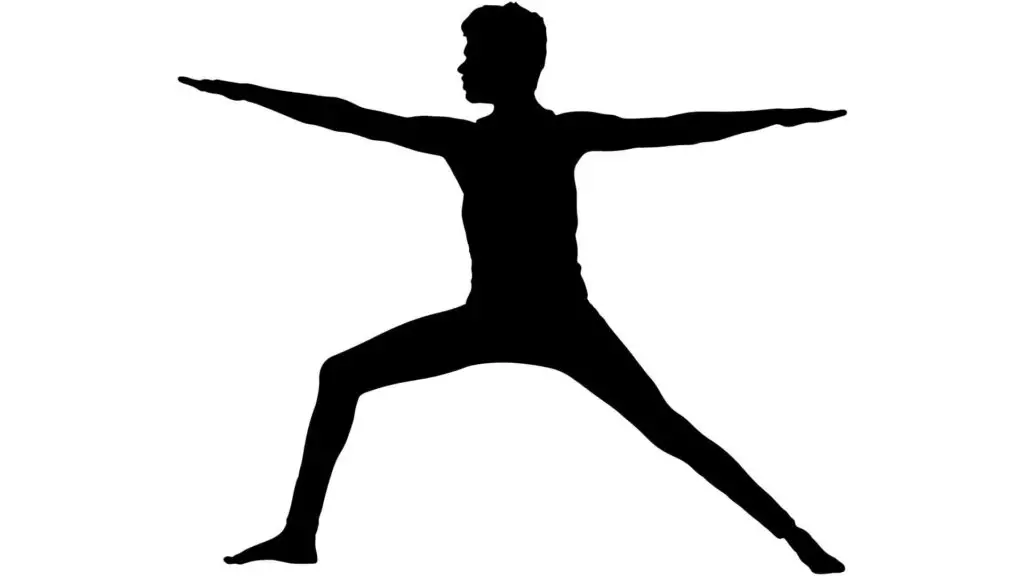 Yoga for soccer players - A Yoga warrior pose silhouette