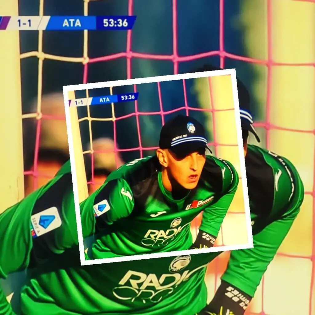 Can goalkeepers wear hats - A soccer goalie wearing a hat and standing in his goals