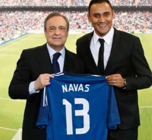 Why do goalkeepers wear number 1 - Keylor Navas and Florentino Perez holding a shirt number 13