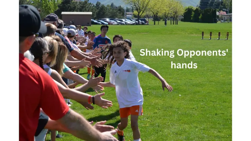 Sportsmanship in soccer - Youth players shaking hands