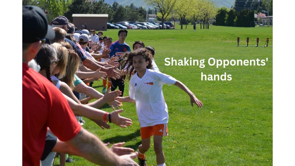 Sportsmanship in soccer - Youth players shaking hands